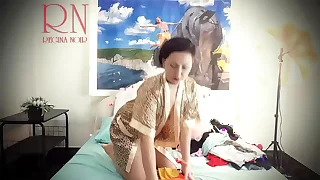 Housewife laid out sexy lingerie and outfits unaffected by the bed&period; She tries unaffected by panties&comma; corsets&comma; bras&comma; socks&comma; stockings&comma; tights&comma; peignoir&period; 1